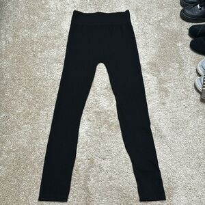 Woman’s Feathers Maternity size small black leggings NWOT